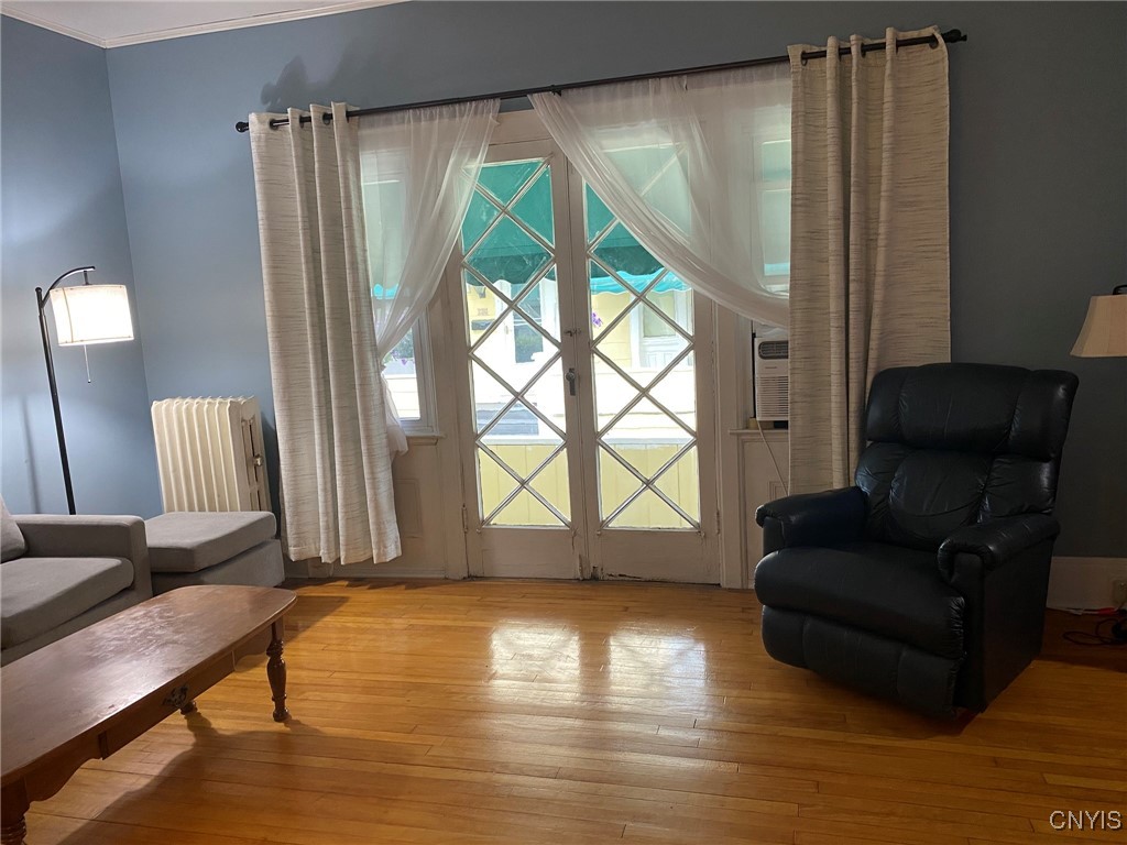 19 Genesee Court, Unit 19 Utica, NY 13502 - Photo 7 of 30 French Doors to Court Yard area