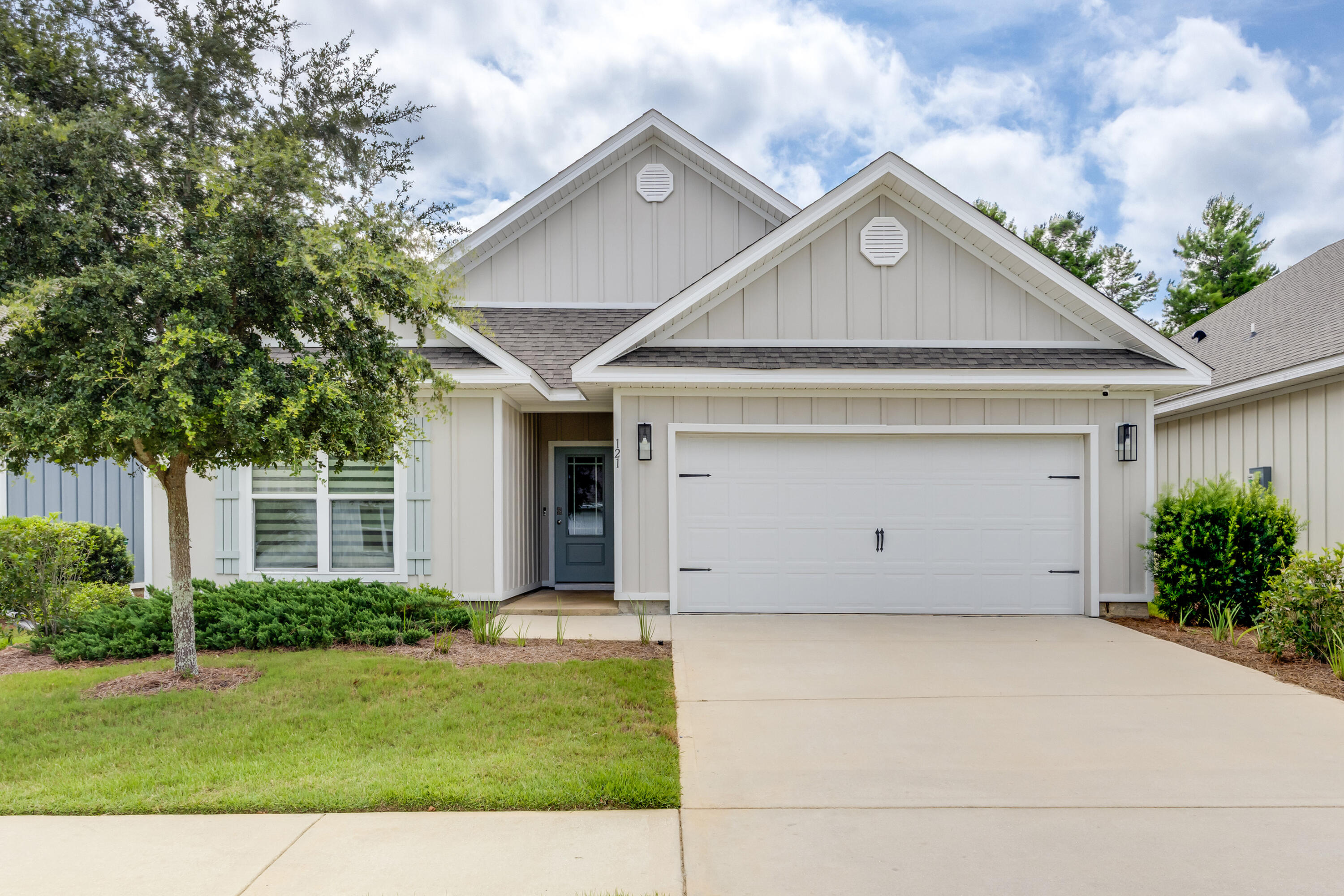 a view of garage and yard