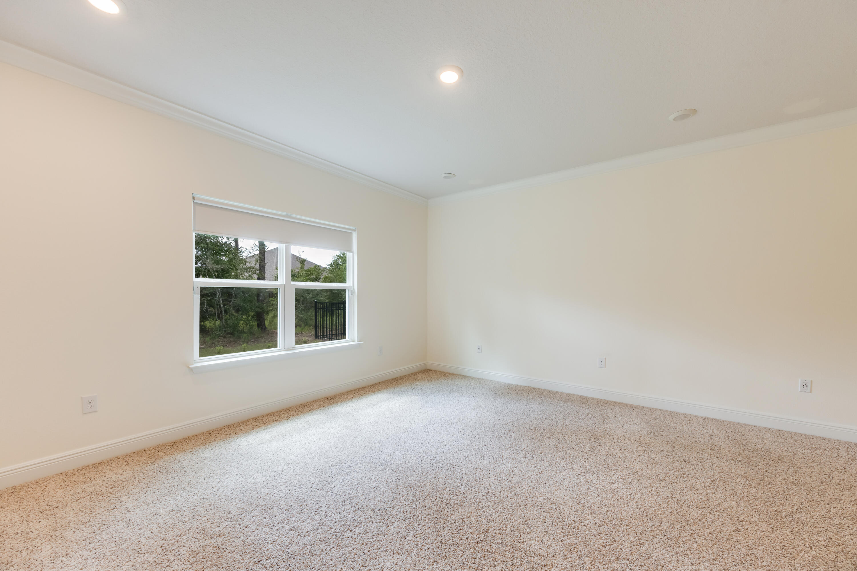 121 Lightning Bug Lane Freeport, FL 32439 - Photo 22 of 53 an empty room with a window