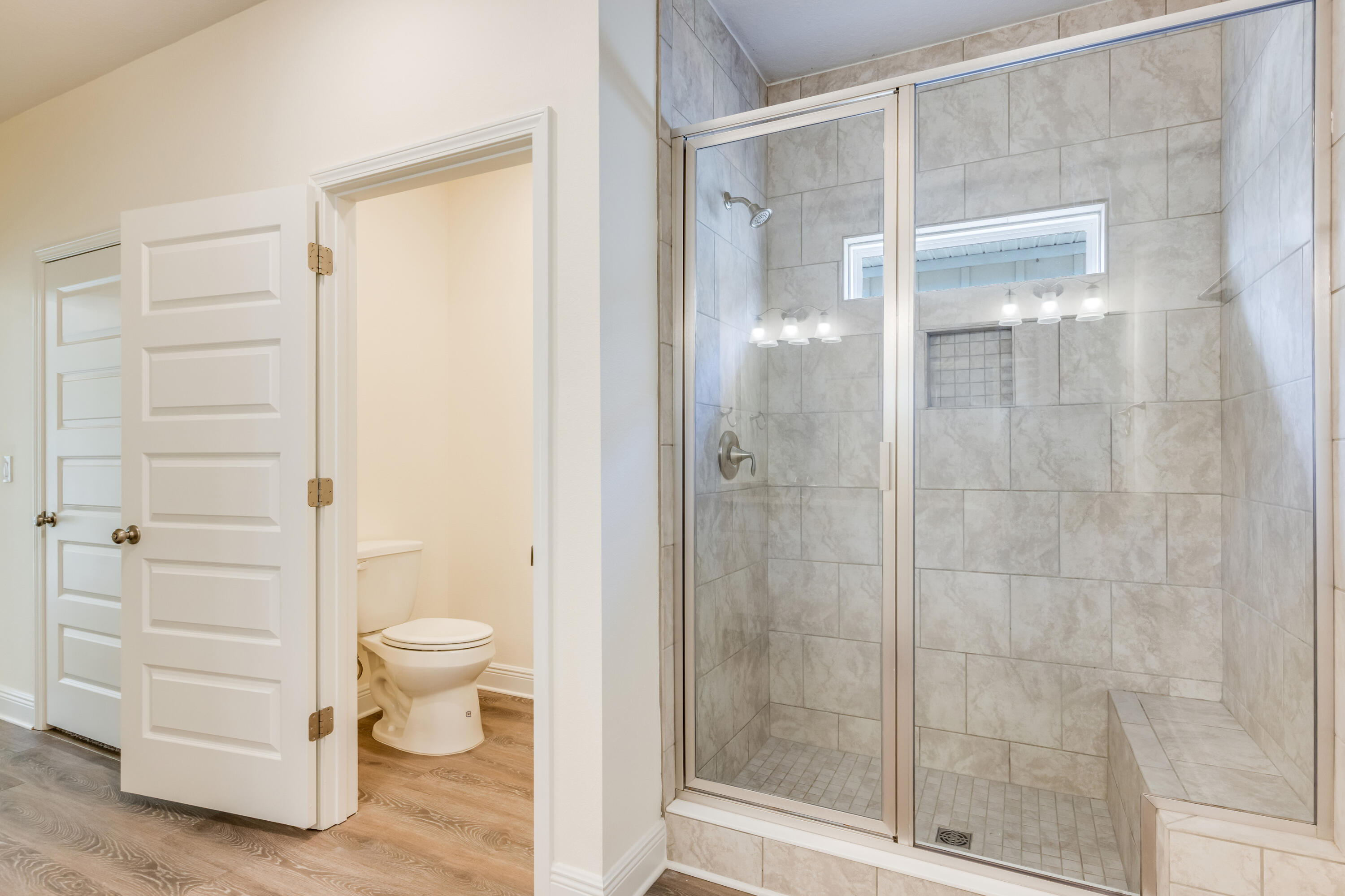 121 Lightning Bug Lane Freeport, FL 32439 - Photo 25 of 53 a bathroom with a shower and a toilet