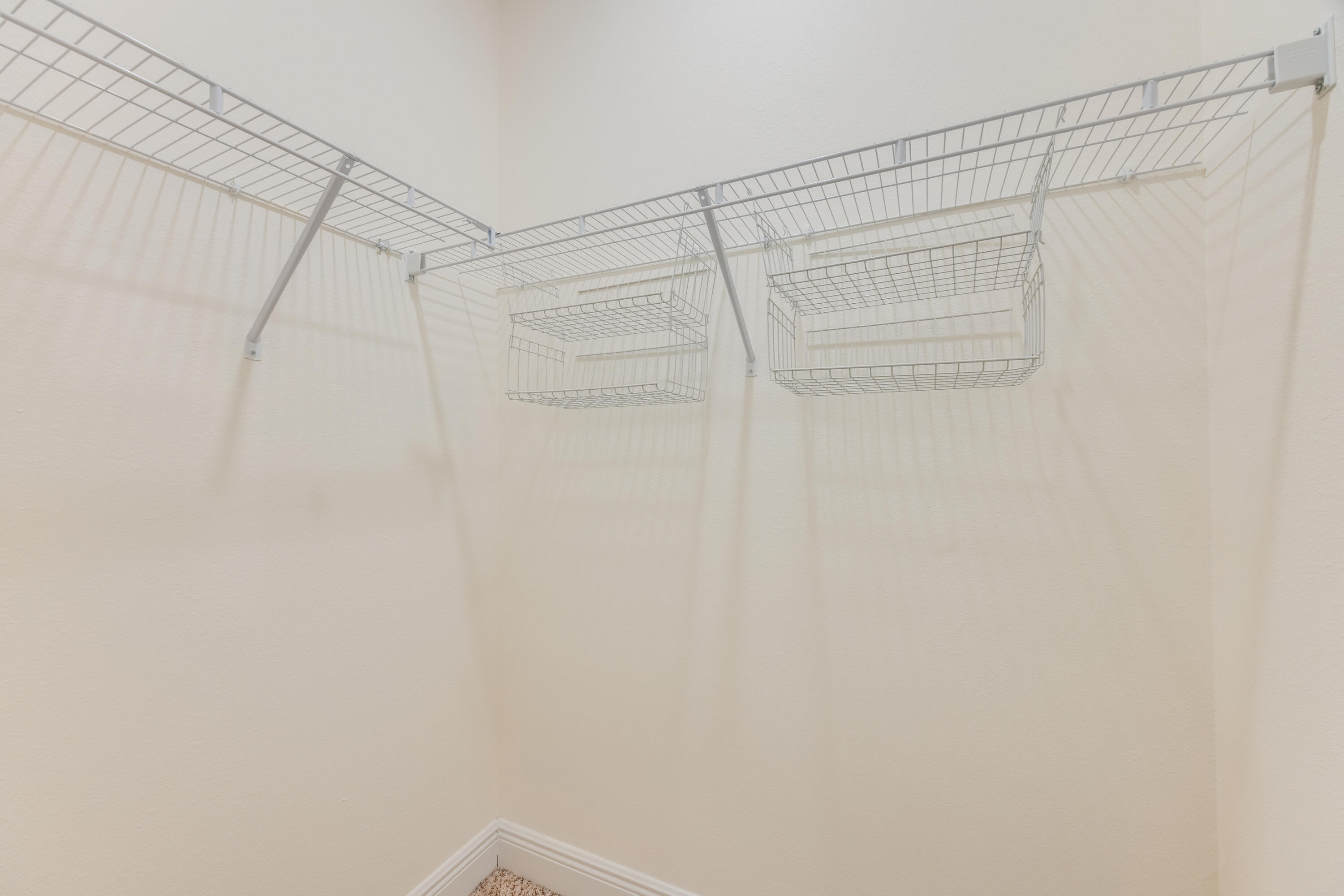 121 Lightning Bug Lane Freeport, FL 32439 - Photo 27 of 53 a view of a room with racks on the wall