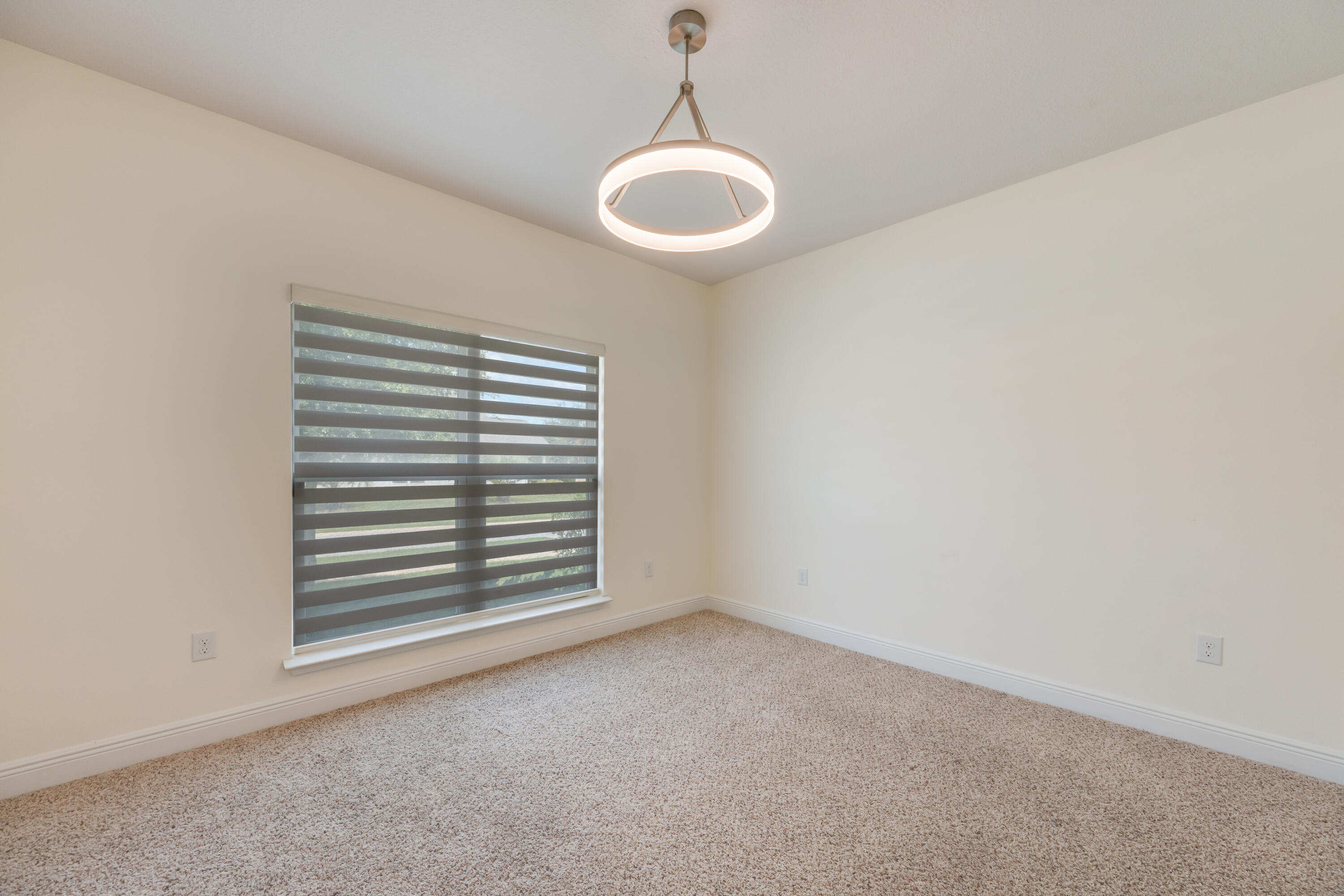 121 Lightning Bug Lane Freeport, FL 32439 - Photo 30 of 53 a view of an empty room with a window