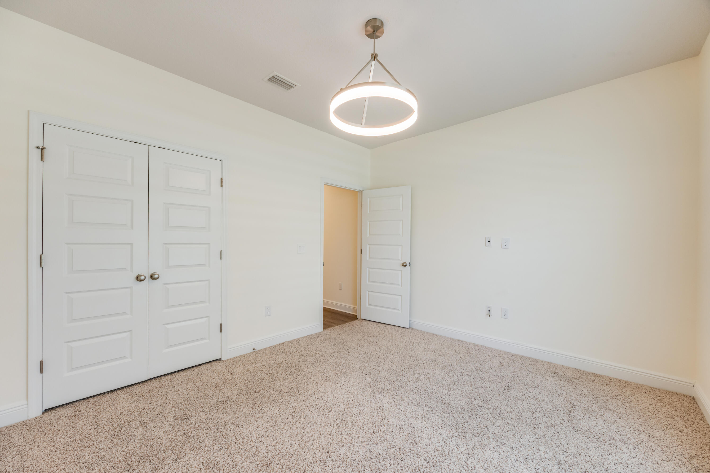 121 Lightning Bug Lane Freeport, FL 32439 - Photo 31 of 53 a view of an empty room and a window