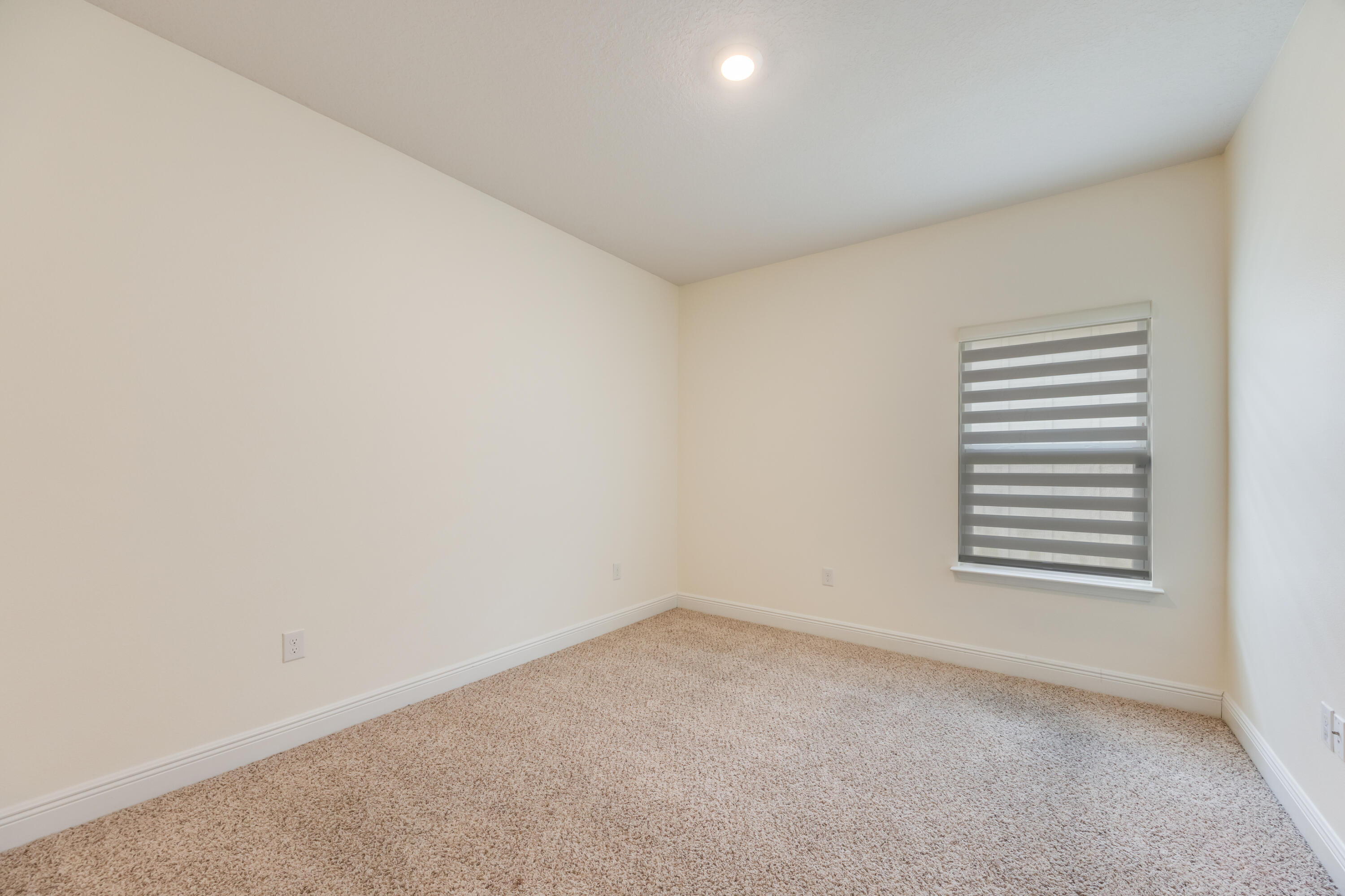 121 Lightning Bug Lane Freeport, FL 32439 - Photo 33 of 53 an empty room with a window