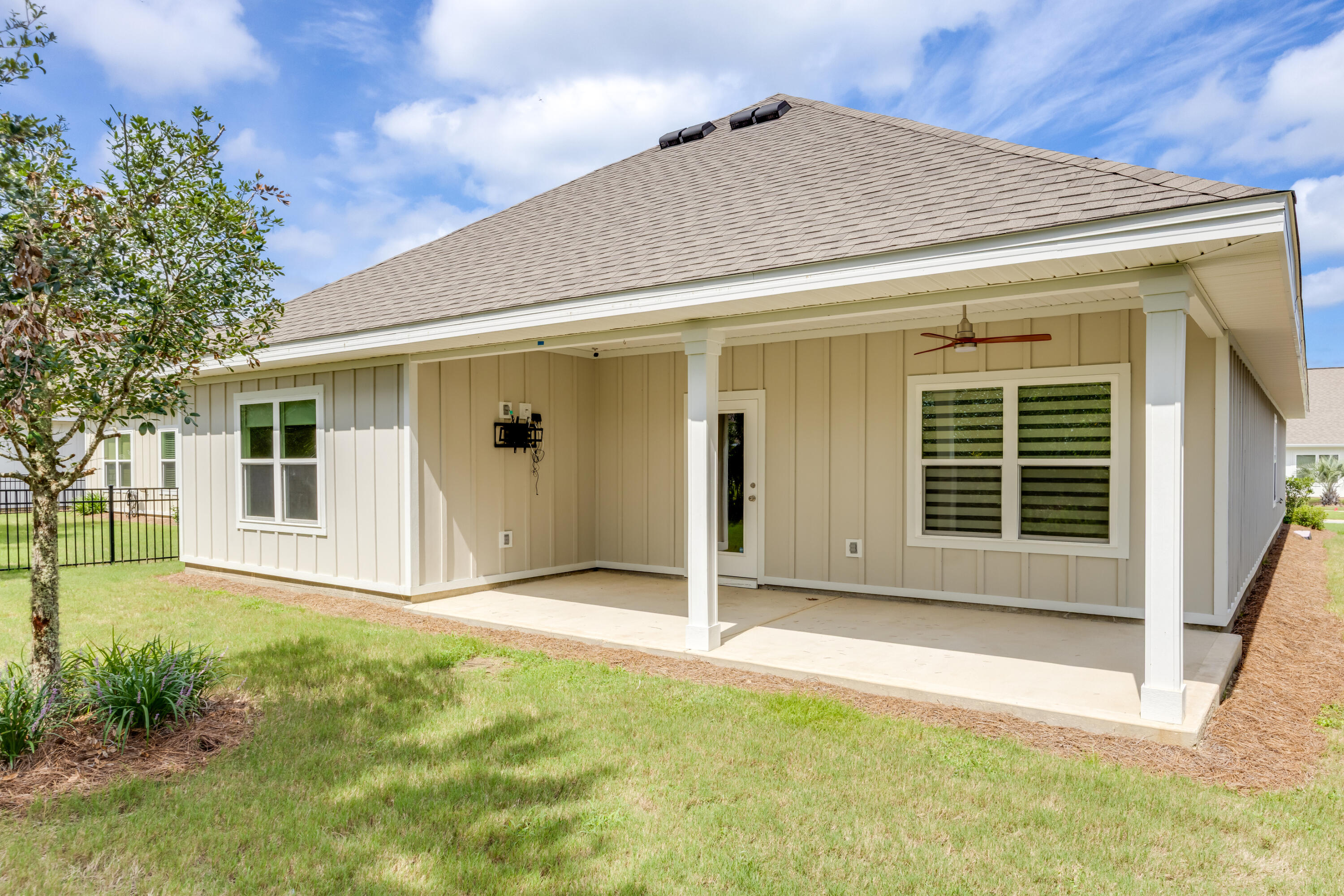 121 Lightning Bug Lane Freeport, FL 32439 - Photo 36 of 53 a view of house with backyard