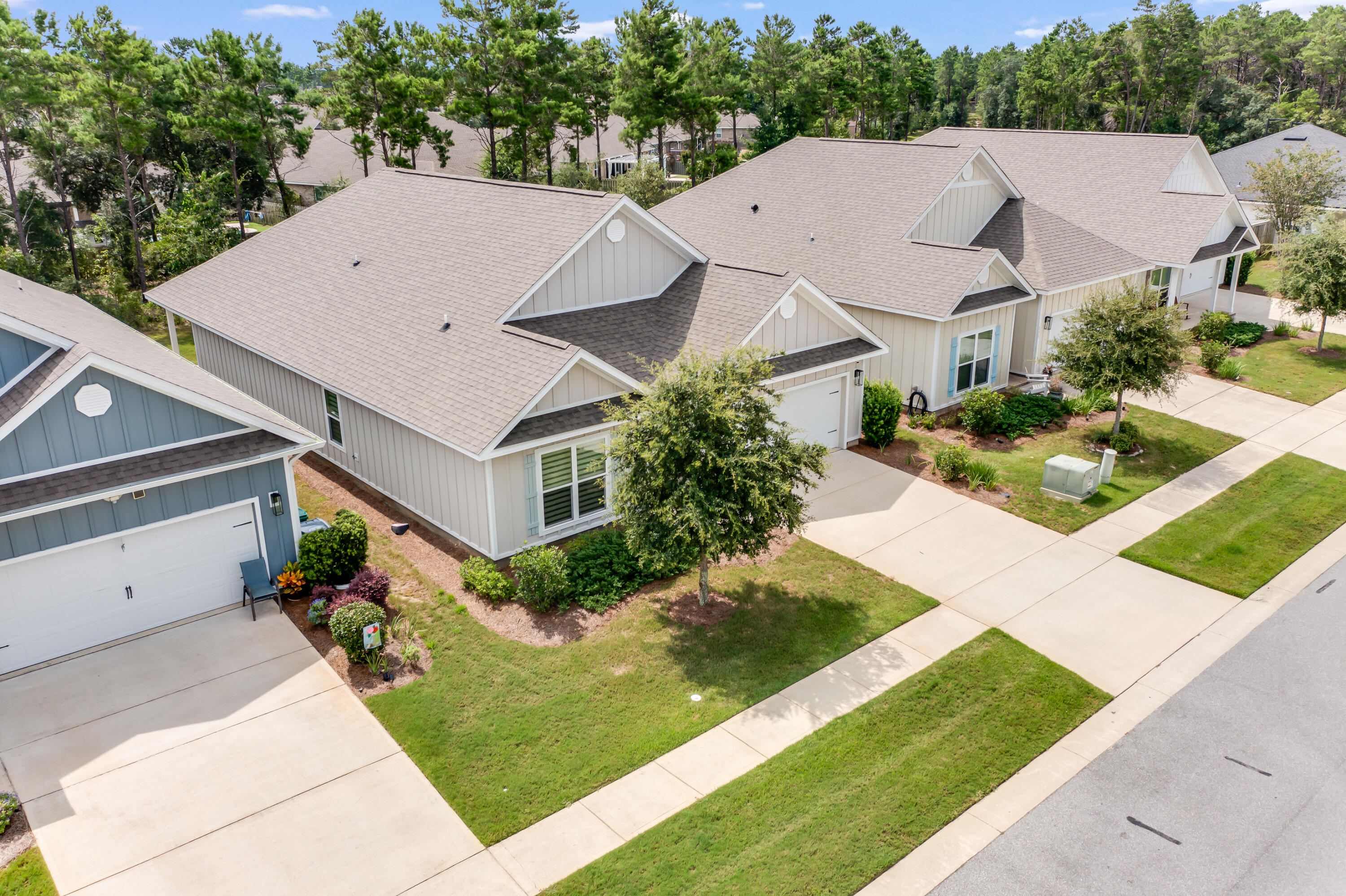 121 Lightning Bug Lane Freeport, FL 32439 - Photo 41 of 53 a aerial view of a house with yard and green space