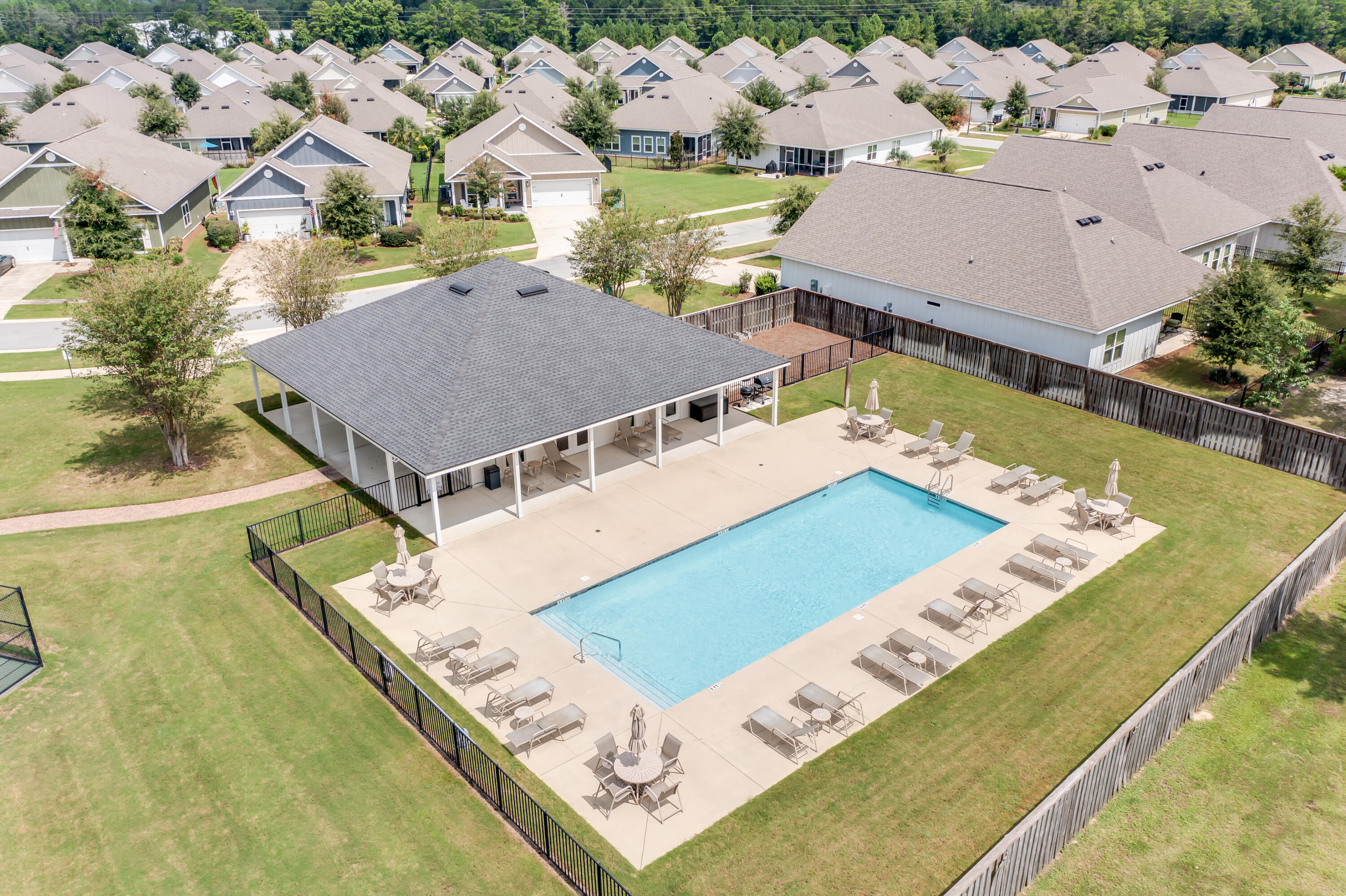 121 Lightning Bug Lane Freeport, FL 32439 - Photo 47 of 53 an aerial view of residential houses with outdoor space and swimming pool