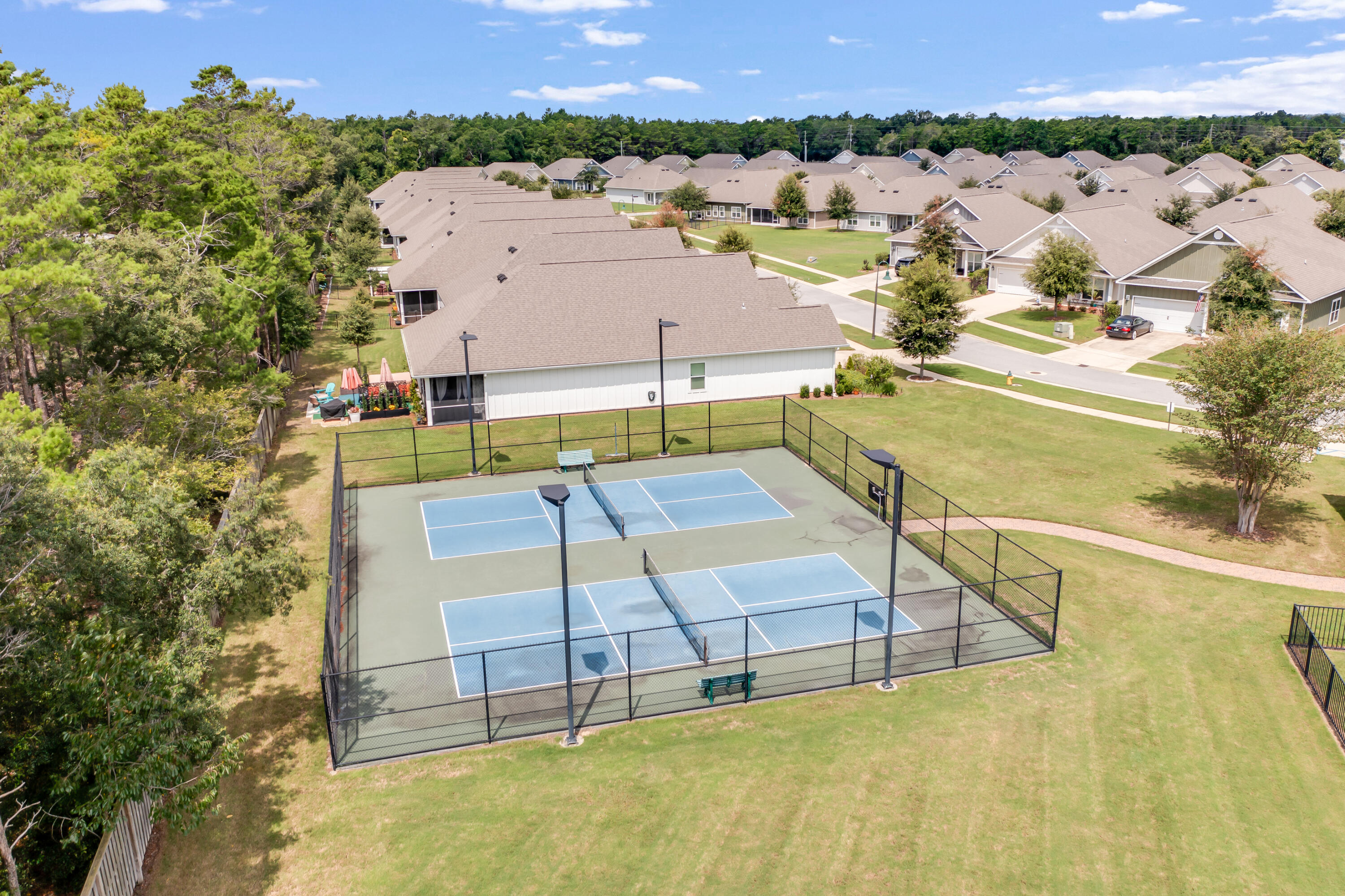 121 Lightning Bug Lane Freeport, FL 32439 - Photo 48 of 53 an aerial view of a house with a swimming pool