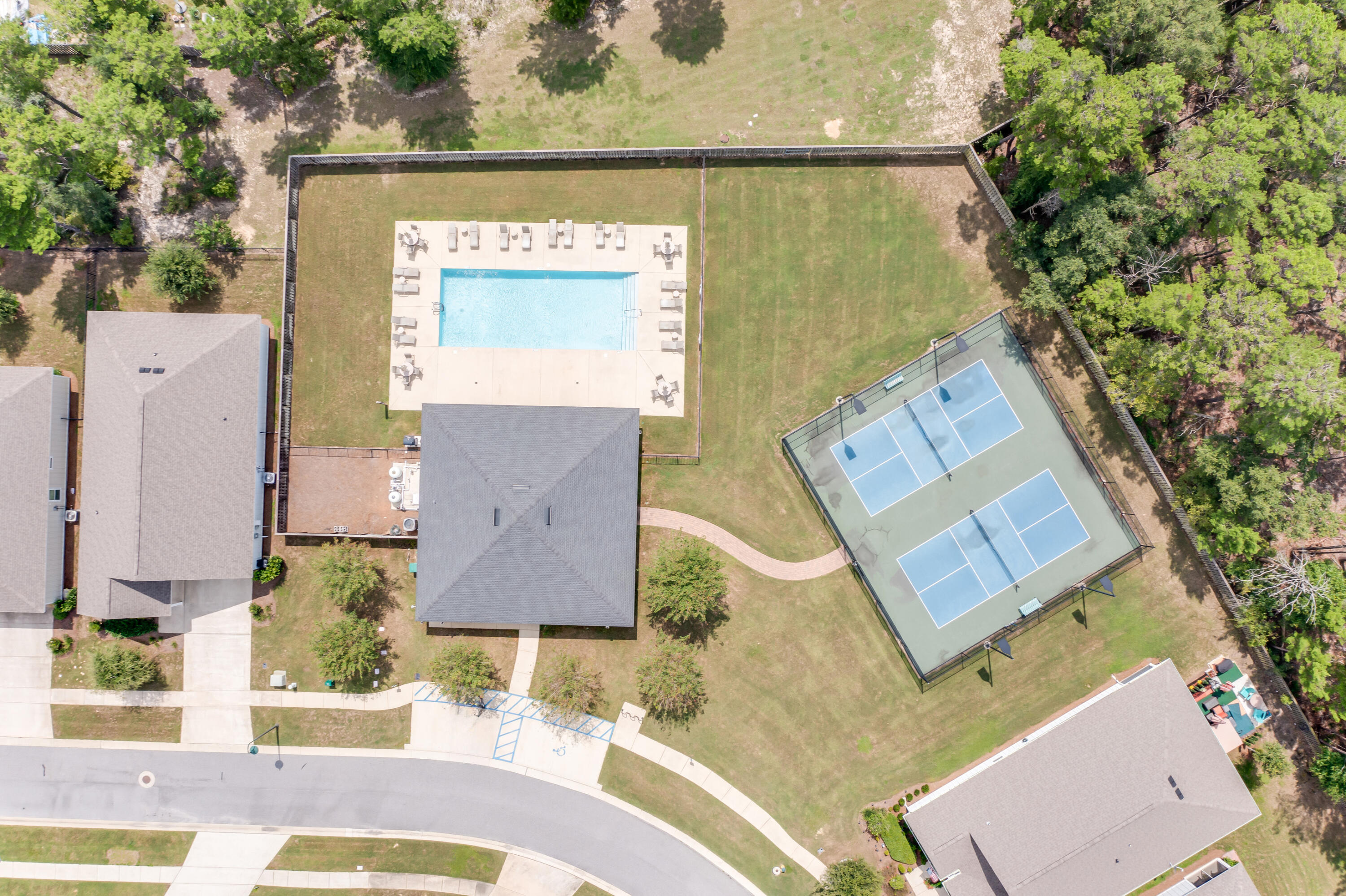 121 Lightning Bug Lane Freeport, FL 32439 - Photo 49 of 53 an aerial view of a house with a swimming pool