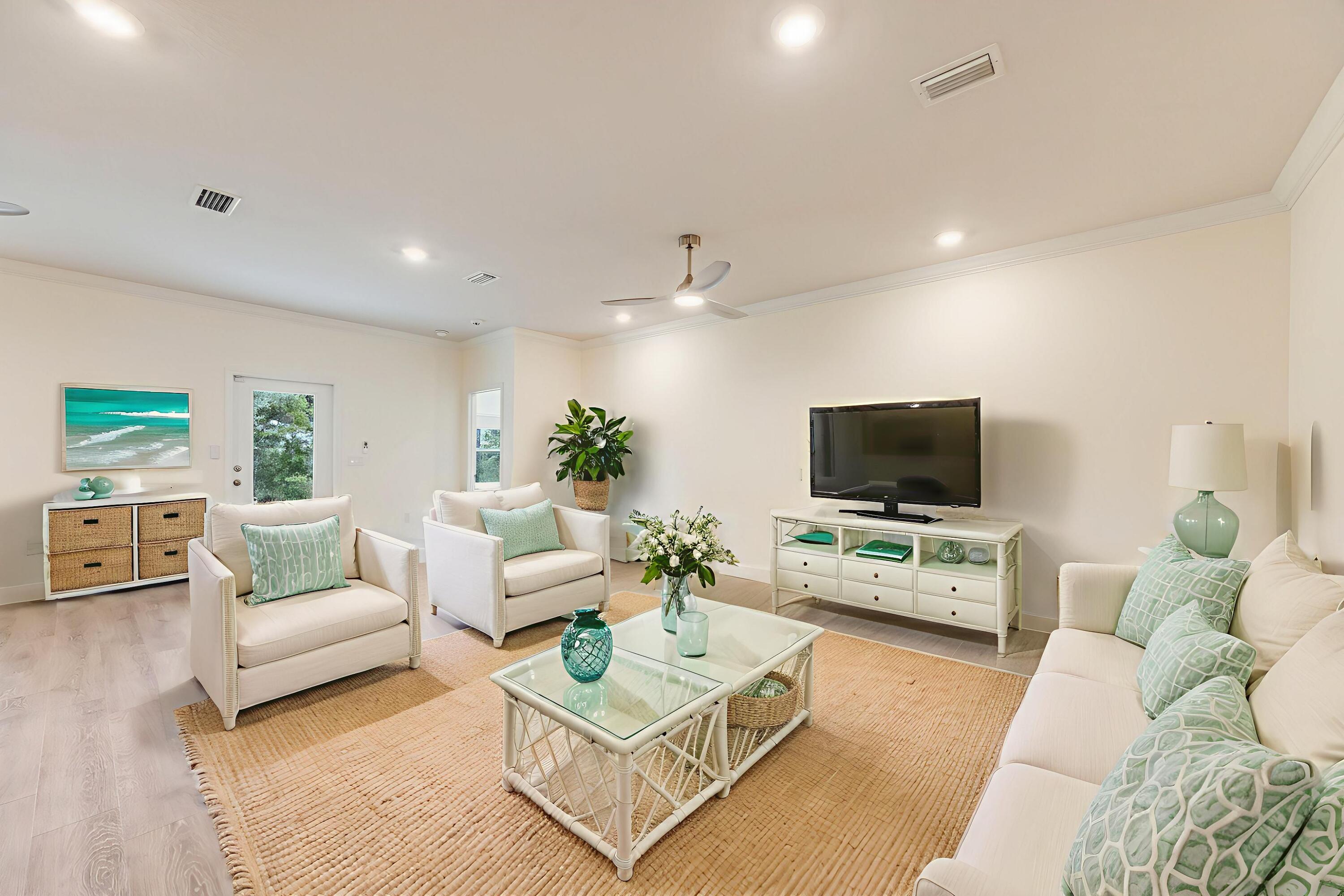 121 Lightning Bug Lane Freeport, FL 32439 - Photo 6 of 53 a living room with furniture and a flat screen tv
