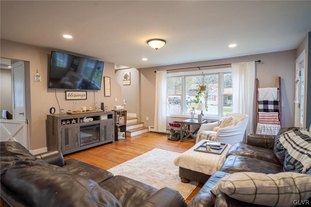 430 Old Grade Road Wind Gap, PA 18091 - Photo 10 of 33 a living room with furniture and a flat screen tv