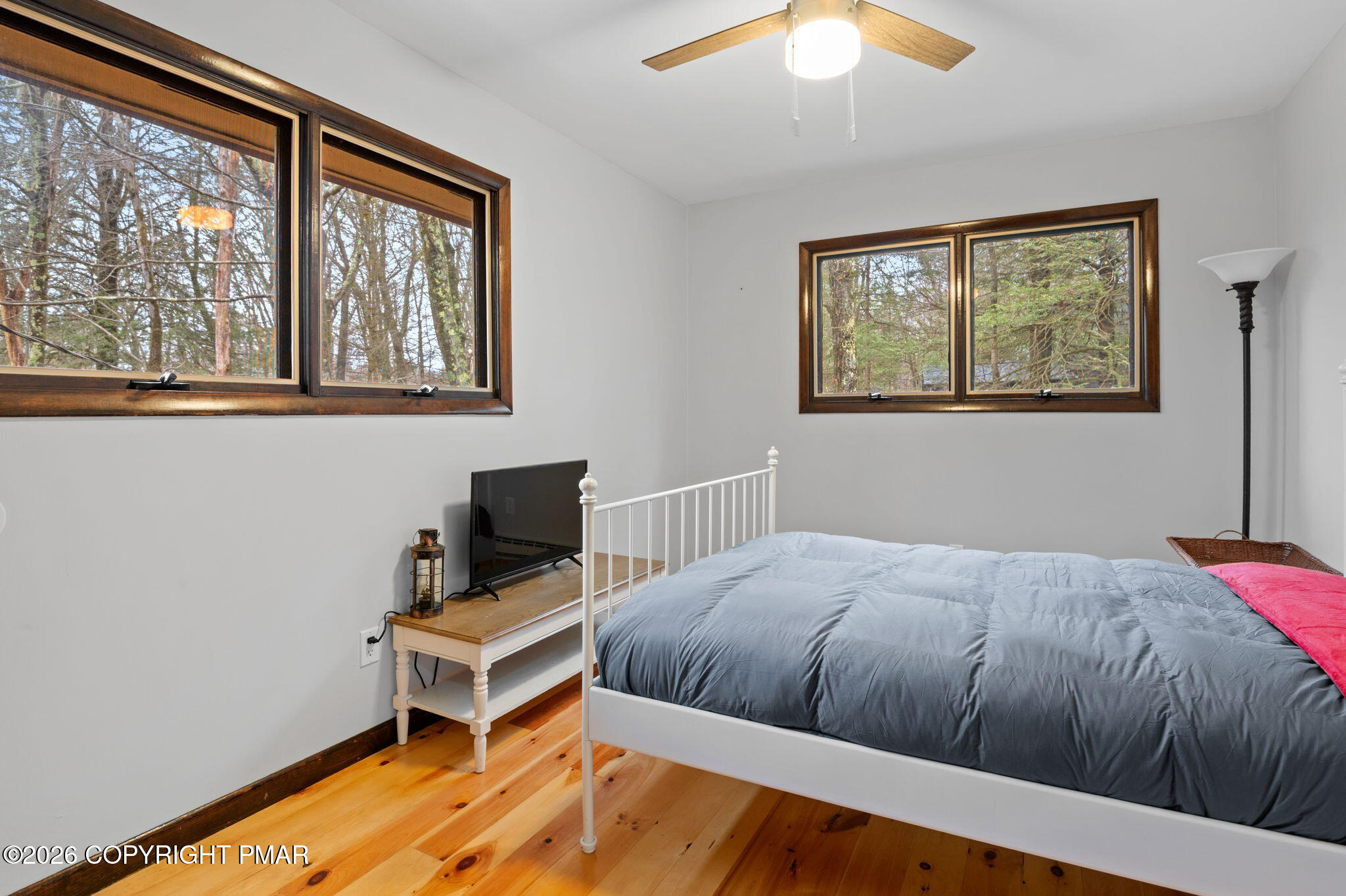 81 Split Rock Road Lake Harmony, PA 18624 - Photo 13 of 36 a bedroom with a bed and a window