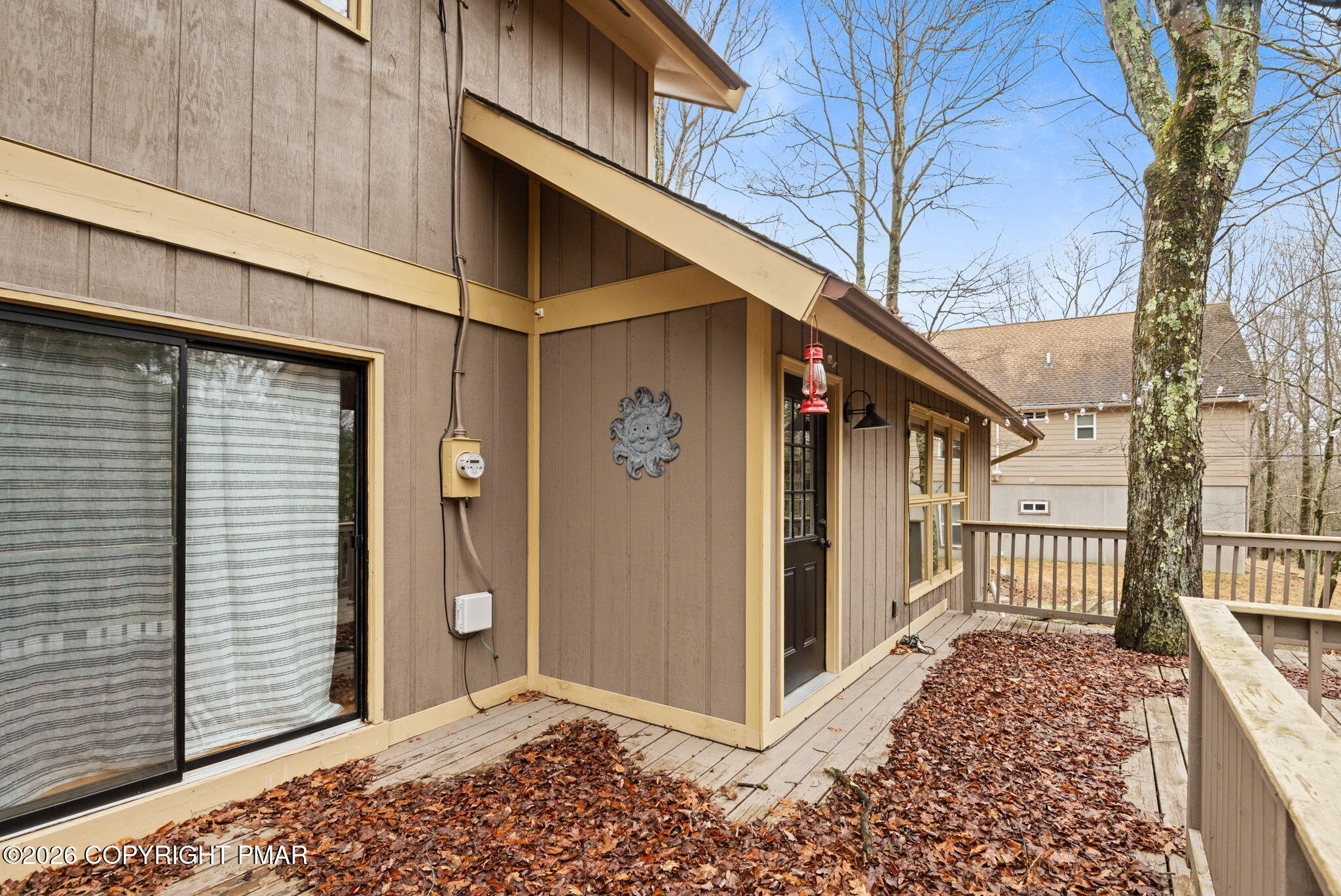 81 Split Rock Road Lake Harmony, PA 18624 - Photo 30 of 36 a view of a house with a small yard next to a house
