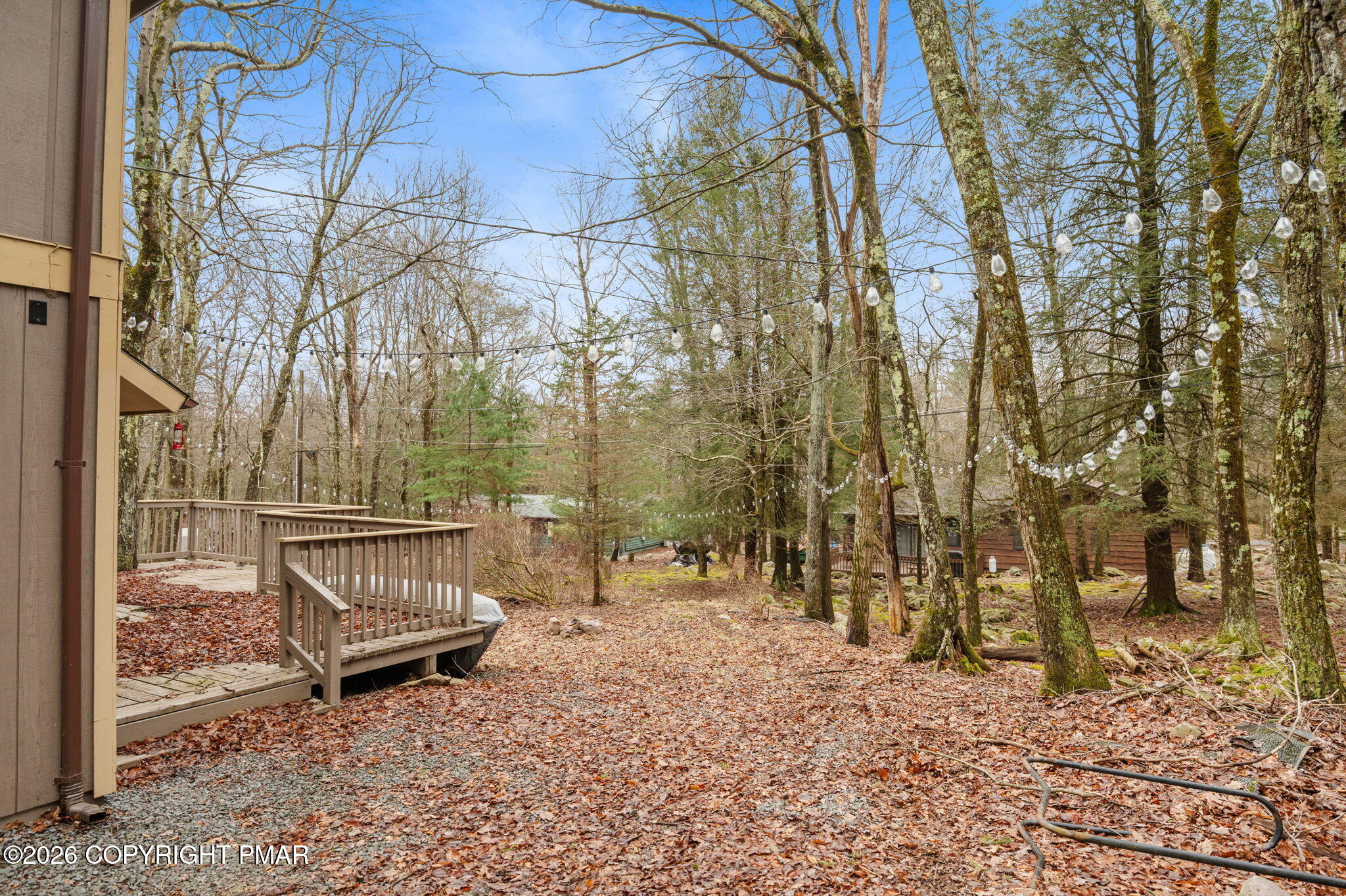 81 Split Rock Road Lake Harmony, PA 18624 - Photo 33 of 36 a view of a bench in a backyard