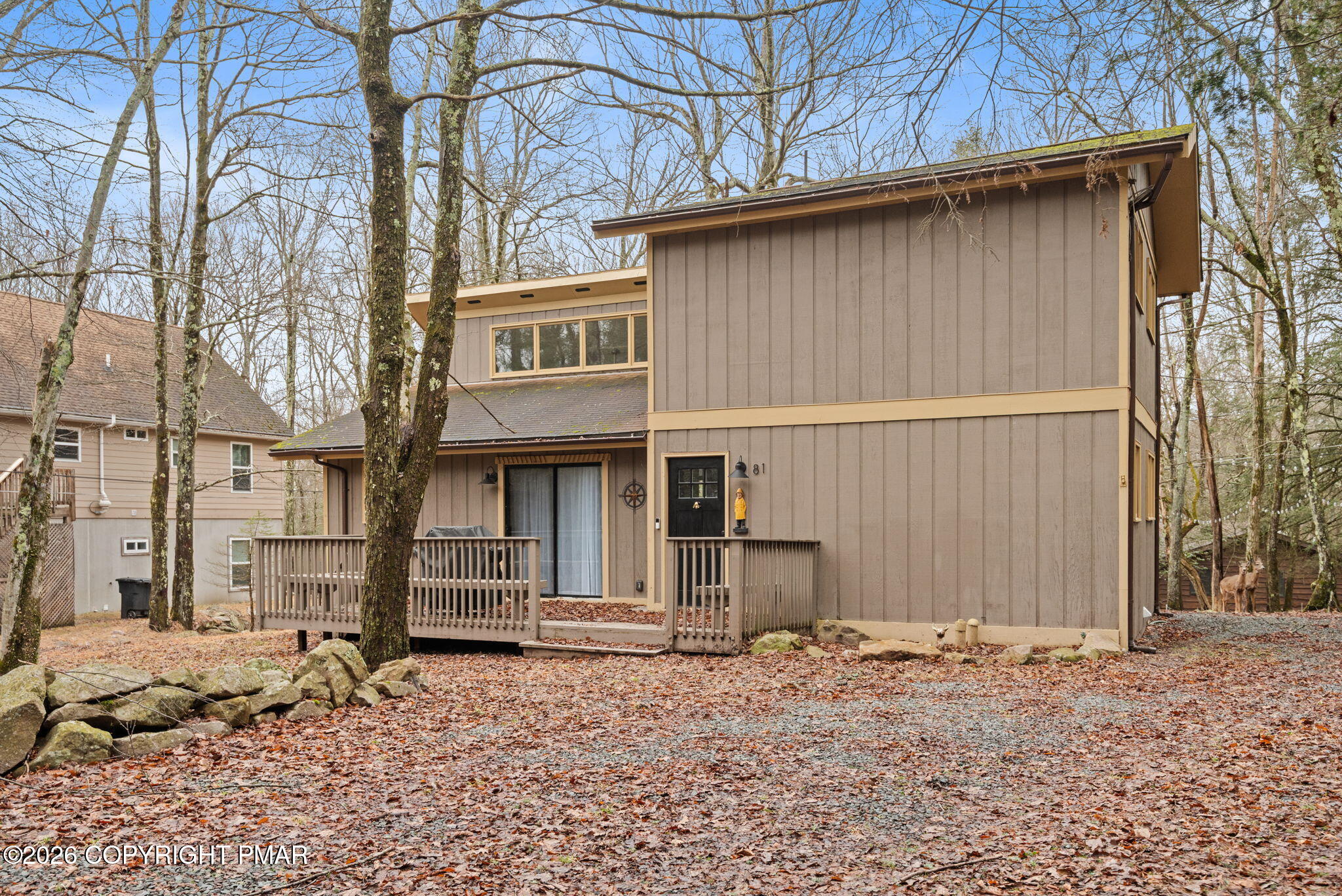 81 Split Rock Road Lake Harmony, PA 18624 - Photo 34 of 36 a front view of a house with a yard
