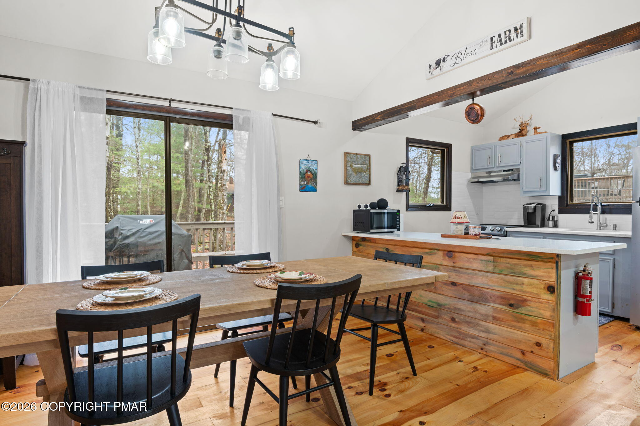 81 Split Rock Road Lake Harmony, PA 18624 - Photo 6 of 36 a view of a dining room with furniture window and outside view