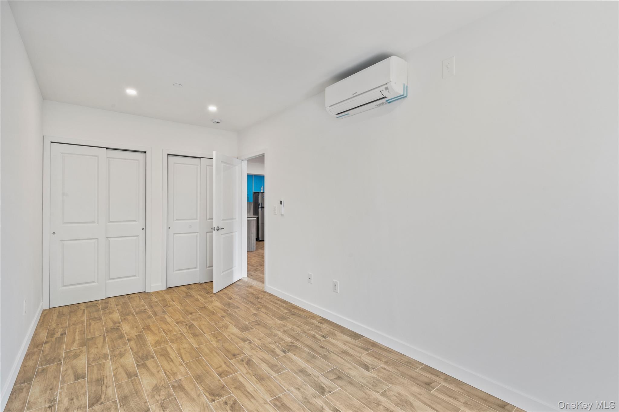 213-41 38th Avenue, Unit 2B Queens, NY 11361 - Photo 6 of 12 a view of empty room