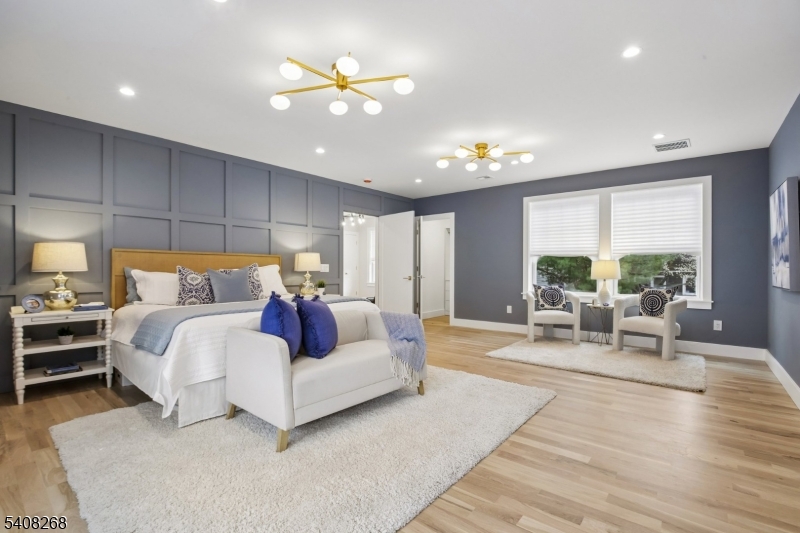 108 Baker Street Maplewood, NJ 07040 - Photo 27 of 46 a bed room with furniture and a large window