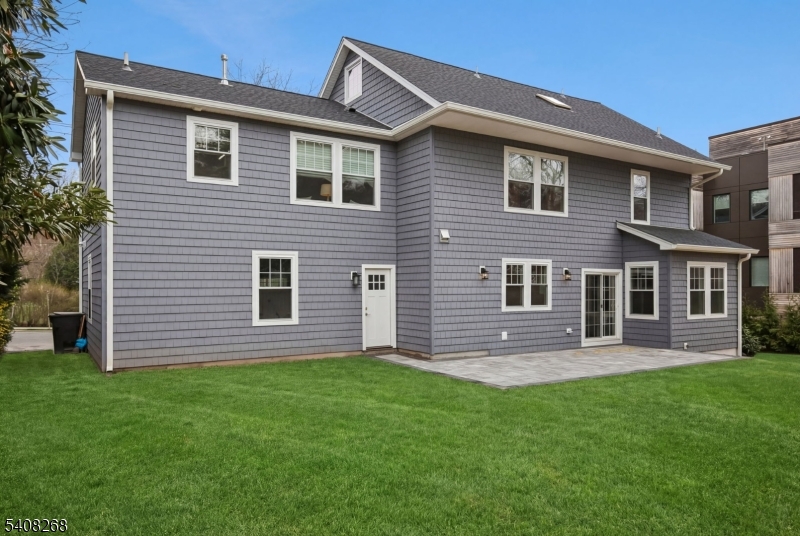108 Baker Street Maplewood, NJ 07040 - Photo 44 of 46 a front view of a house with a yard