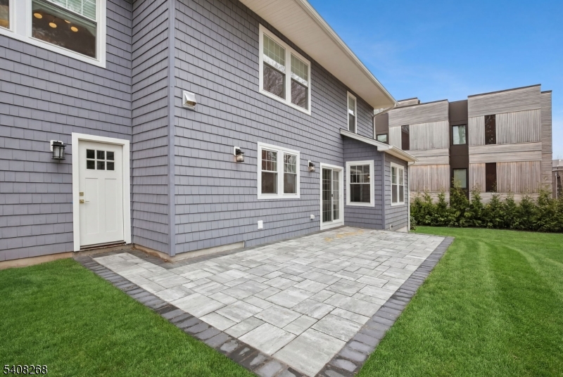 108 Baker Street Maplewood, NJ 07040 - Photo 45 of 46 a front view of a house with a yard