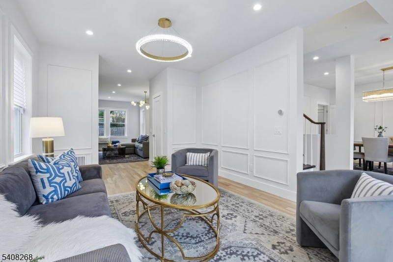 108 Baker Street Maplewood, NJ 07040 - Photo 5 of 46 a living room with furniture and a rug