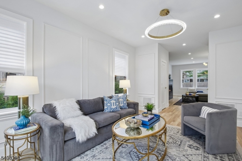 108 Baker Street Maplewood, NJ 07040 - Photo 8 of 46 a living room with furniture and a wooden floor