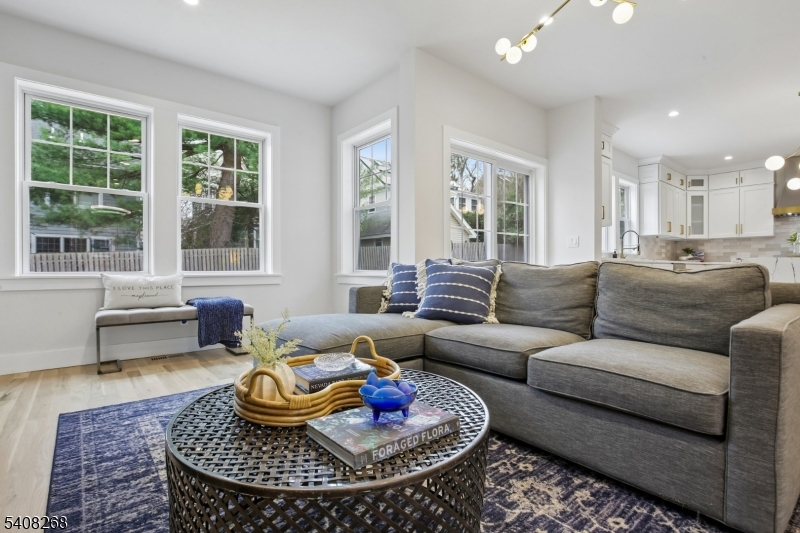 108 Baker Street Maplewood, NJ 07040 - Photo 9 of 46 a living room with furniture and a large window