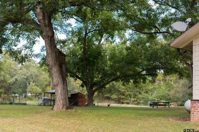 a view of a house with a park