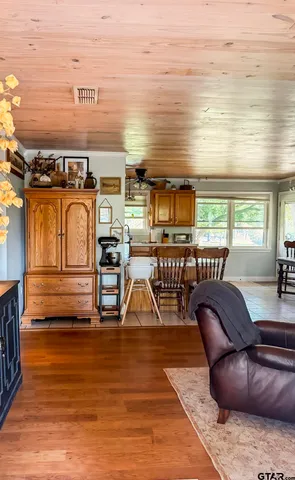 a view of a swimming pool with a lounge chair