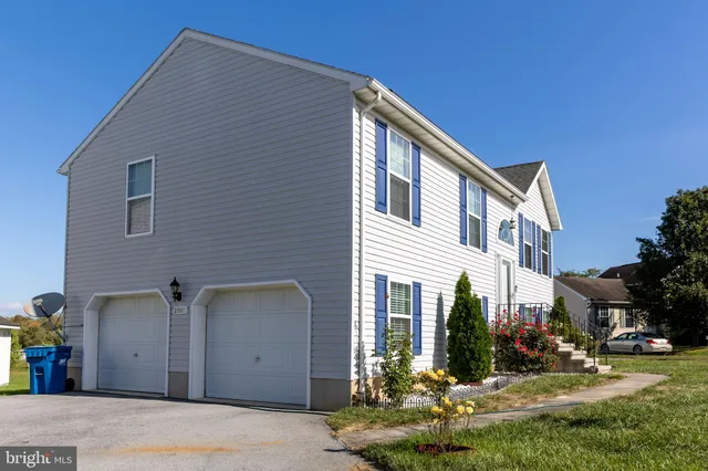 a view of a house with a garage