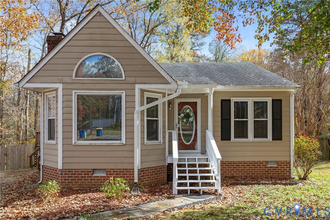 14319 Key Deer Drive Midlothian, VA 23112 - Photo 1 of 42 a front view of a house with a yard