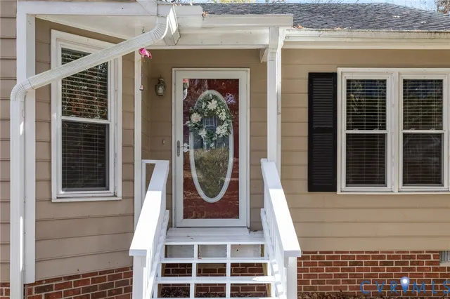 a front view of a house with a porch