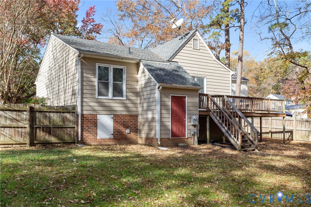 14319 Key Deer Drive Midlothian, VA 23112 - Photo 32 of 42 a view of a house with a yard