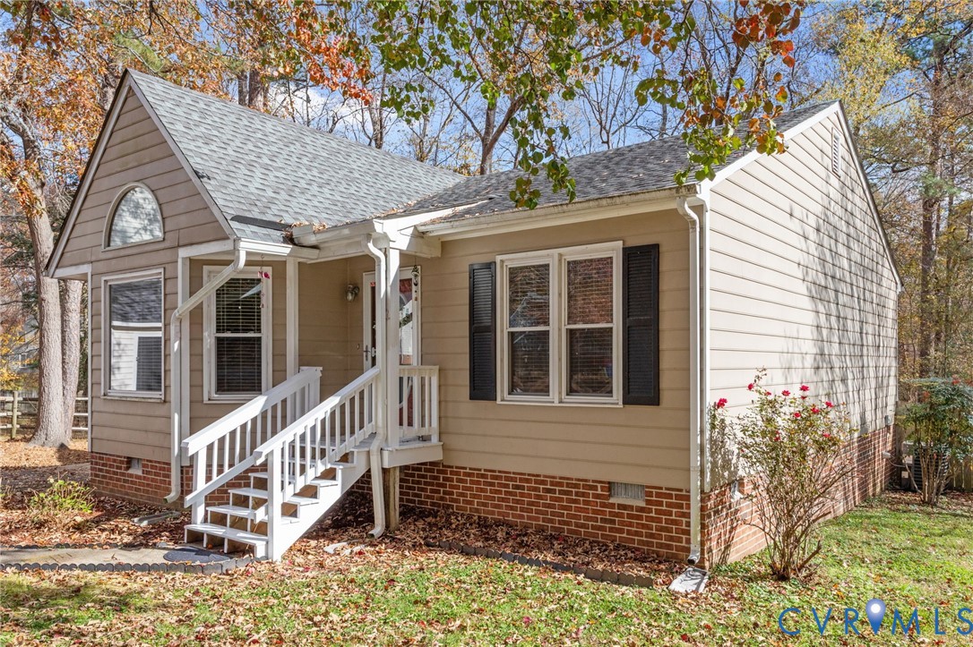 14319 Key Deer Drive Midlothian, VA 23112 - Photo 40 of 42 a front view of a house with a porch