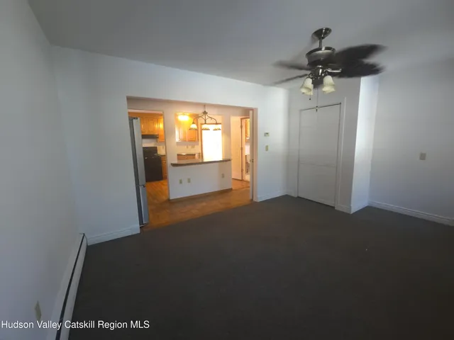 a view of swimming pool with chairs