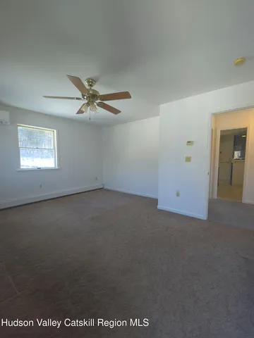 a bathroom with a toilet and a sink