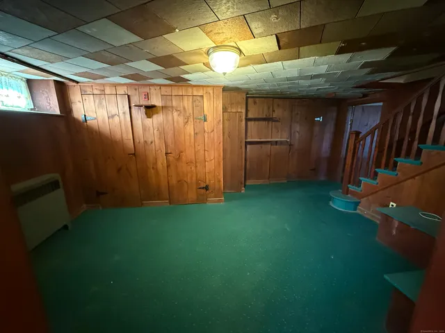 a view of backyard with tub