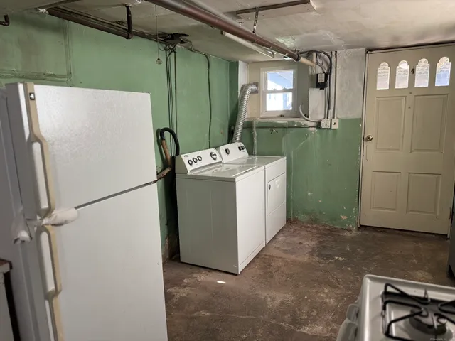 a view of a house with a street