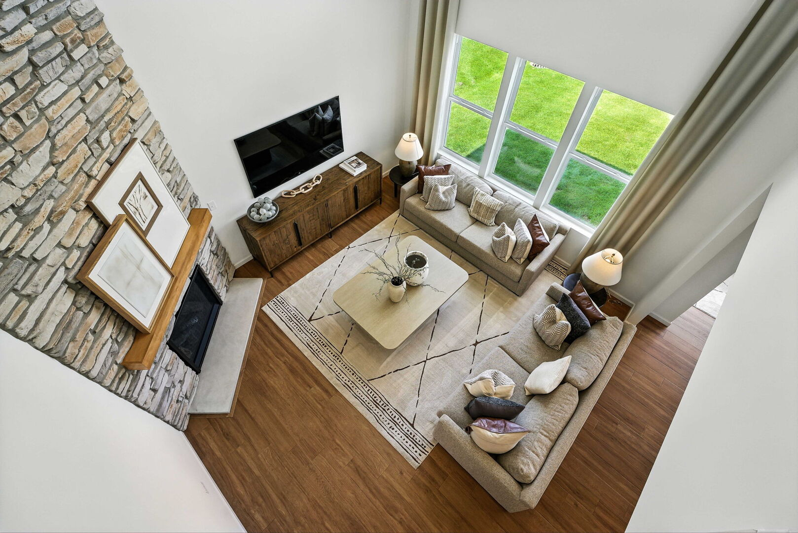 3058 Adler Street New Lenox, IL 60451 - Photo 16 of 17 a living room with furniture and a flat screen tv
