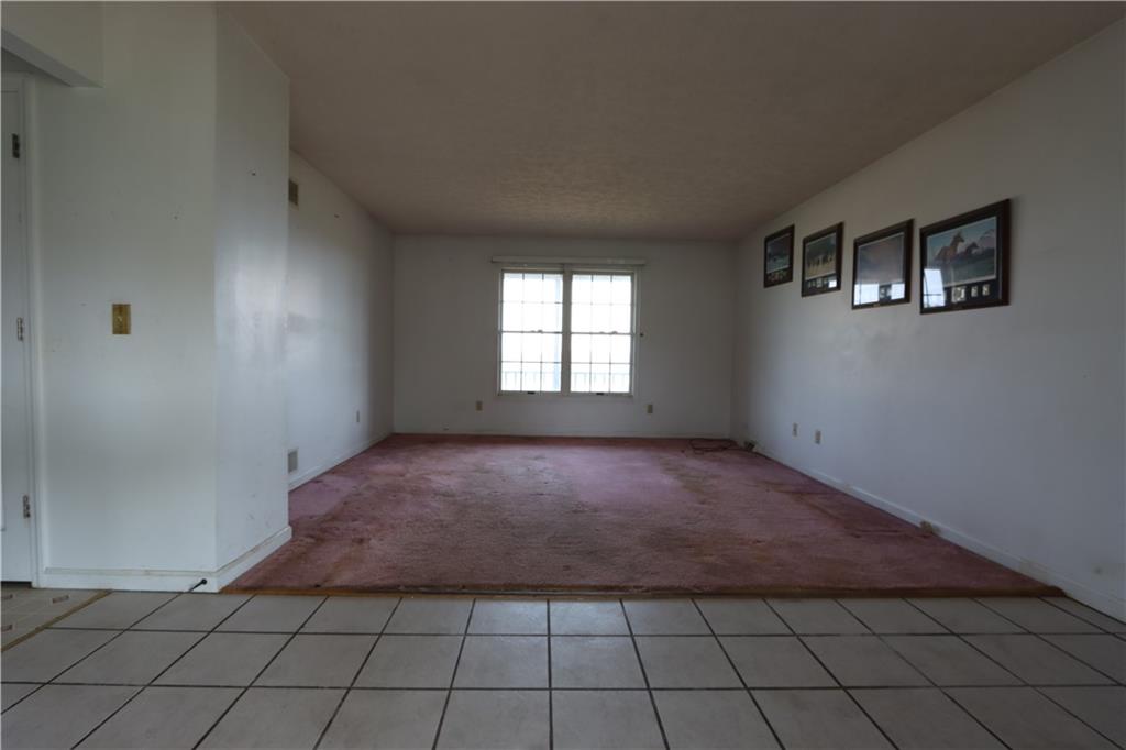370 Pfeifer Road Harmony, PA 16037 - Photo 3 of 35 an empty room with windows