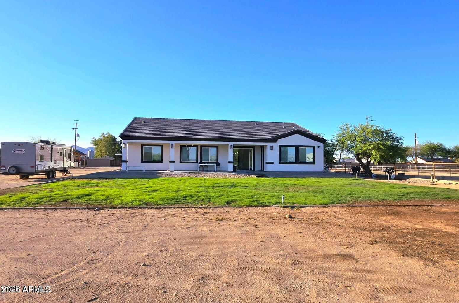22417 West Lower Buckeye Road Buckeye, AZ 85326 - Photo 27 of 40 distant full backyard view