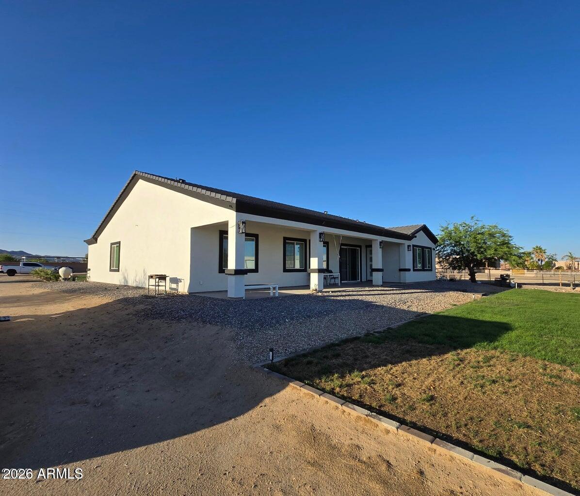 22417 West Lower Buckeye Road Buckeye, AZ 85326 - Photo 39 of 40 Side angle backyard view