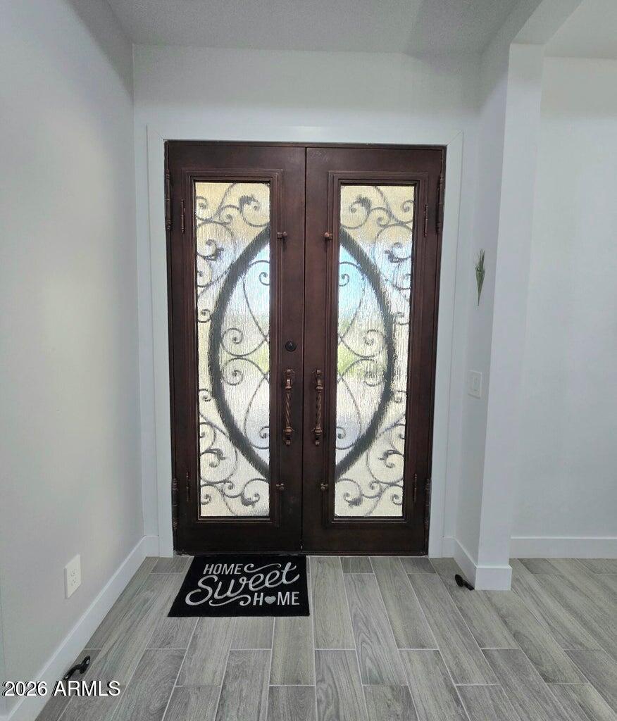 22417 West Lower Buckeye Road Buckeye, AZ 85326 - Photo 6 of 40 Interior of double entry door