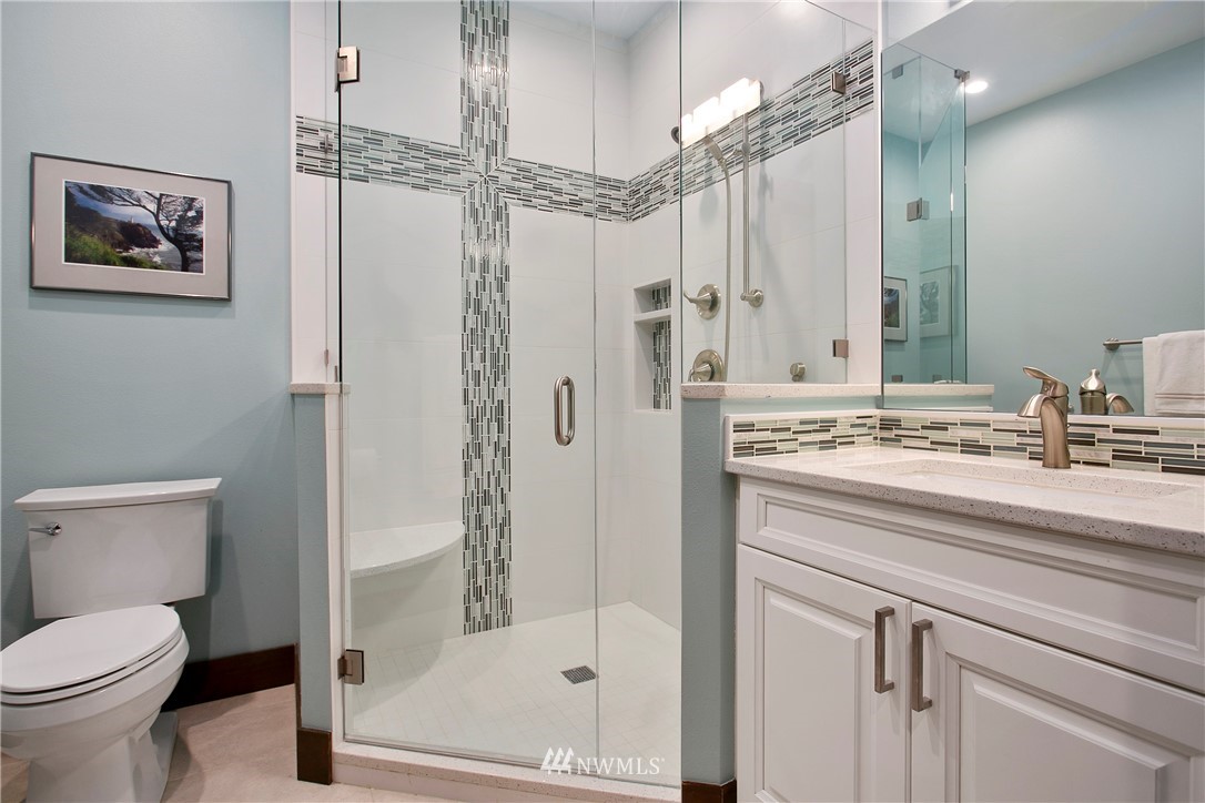 1130 West Axton Road Ferndale, WA 98248 - Photo 23 of 40 a bathroom with a sink a toilet and shower