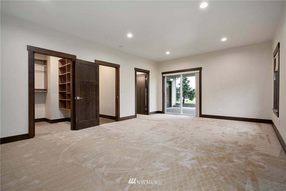 1130 West Axton Road Ferndale, WA 98248 - Photo 27 of 40 a view of an empty room with closet and windows