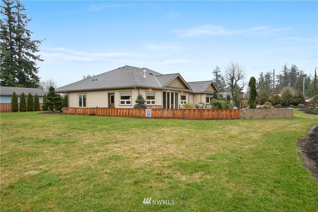 1130 West Axton Road Ferndale, WA 98248 - Photo 33 of 40 a front view of a house with garden