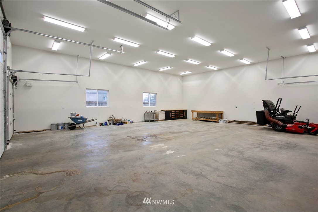 1130 West Axton Road Ferndale, WA 98248 - Photo 36 of 40 a view of a room with gym equipment and a large window