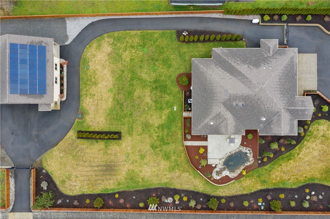 1130 West Axton Road Ferndale, WA 98248 - Photo 38 of 40 an aerial view of a swimming pool
