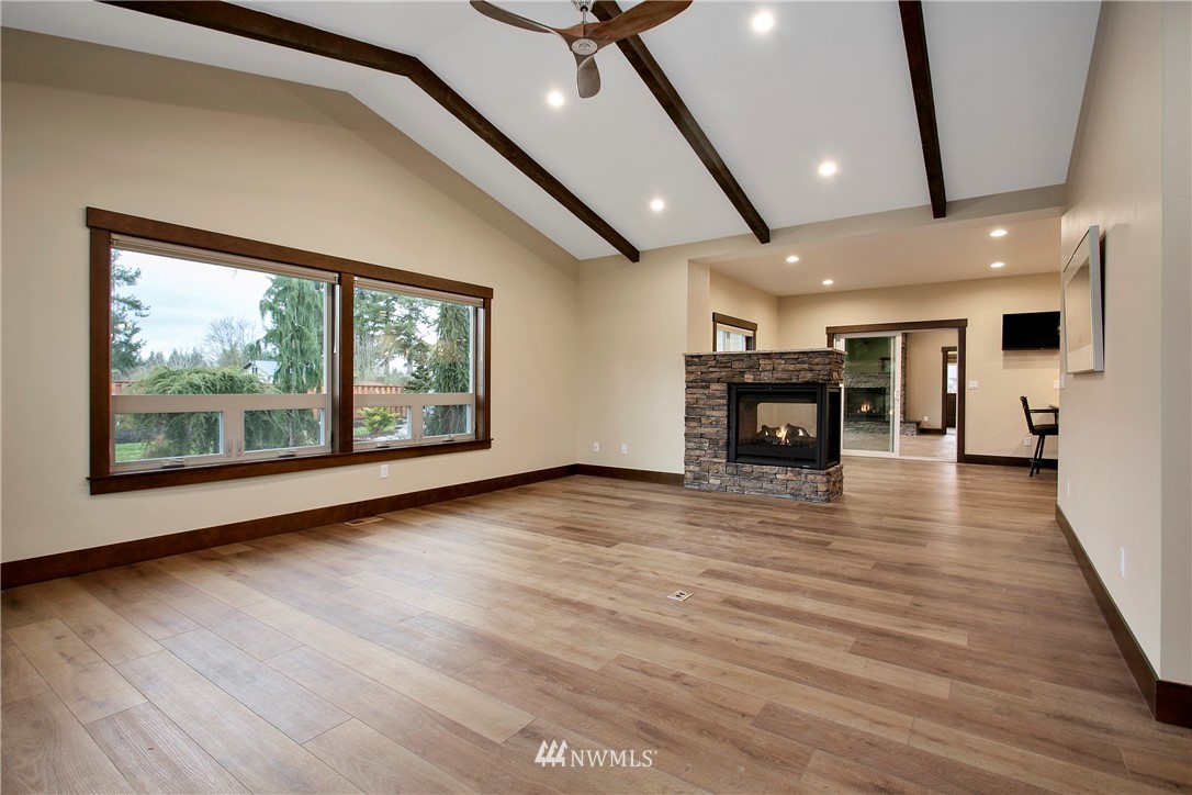 1130 West Axton Road Ferndale, WA 98248 - Photo 4 of 40 a view of a livingroom with furniture wooden floor and window