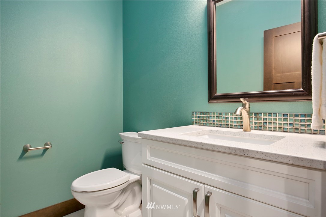 1130 West Axton Road Ferndale, WA 98248 - Photo 6 of 40 a bathroom with a sink and a toilet